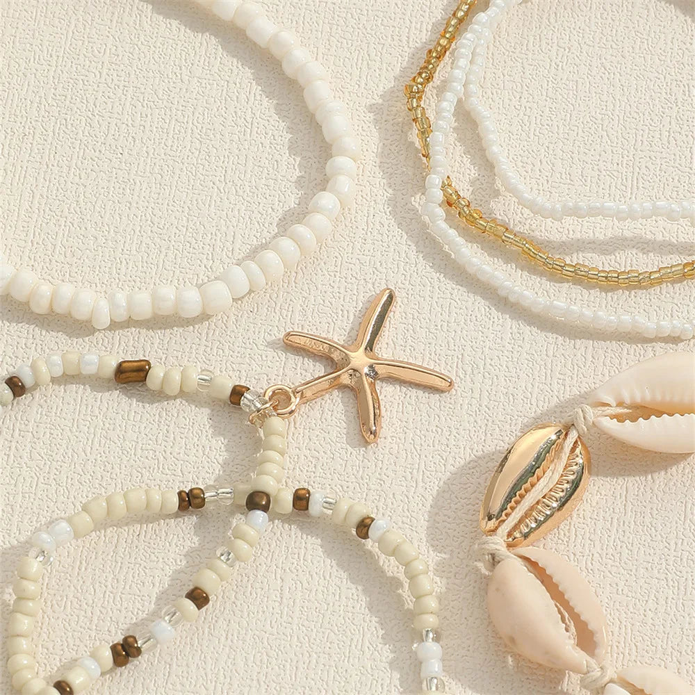Coastal Beaded Bracelet Stack (7-Pack) | Starfish + Shell Charms (White/Gold)