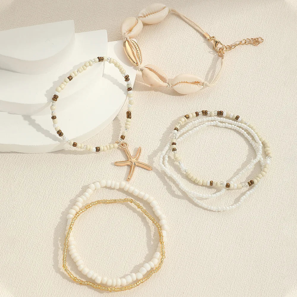 Coastal Beaded Bracelet Stack (7-Pack) | Starfish + Shell Charms (White/Gold)